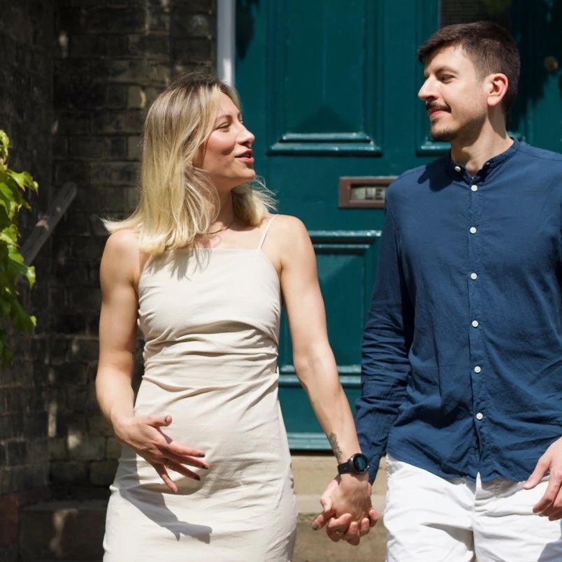 A couple arriving at the Floatwell villa in Cambridge