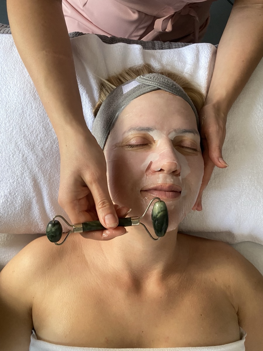 A deluxe facial in progress at Floatwell Cambridge, using jade rollers