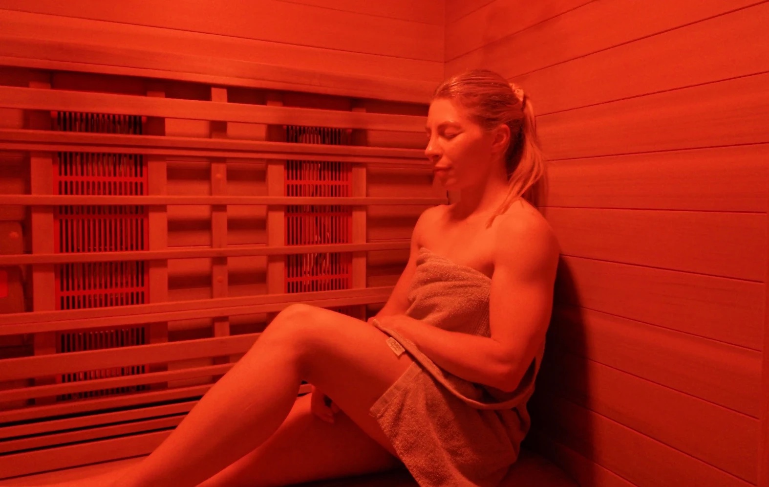 A member in the full-spectrum infrared sauna at Floatwell Cambridge