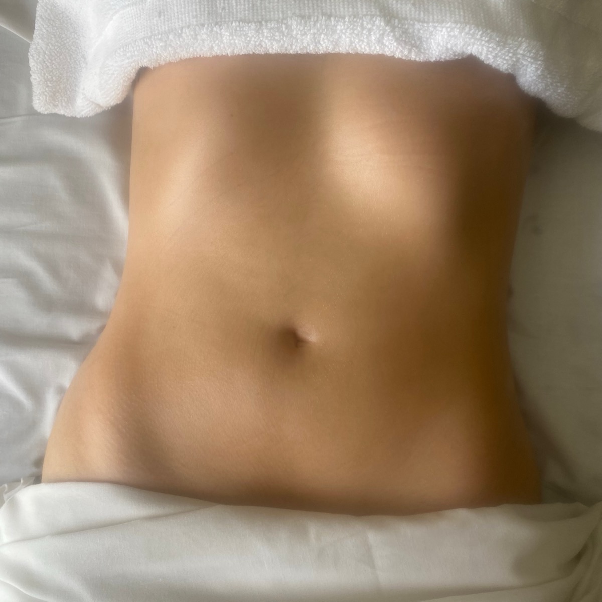 A client resting after a lymphatic drainage massage at Floatwell Cambridge