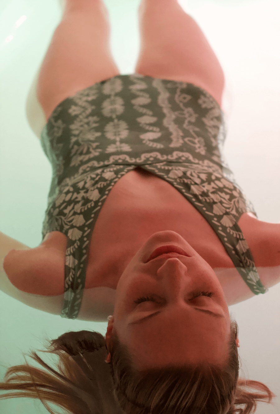 A floater resting at the surface of the pod at Floatwell Cambridge